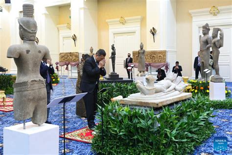 Cambodia celebrates return of 70 looted artifacts.